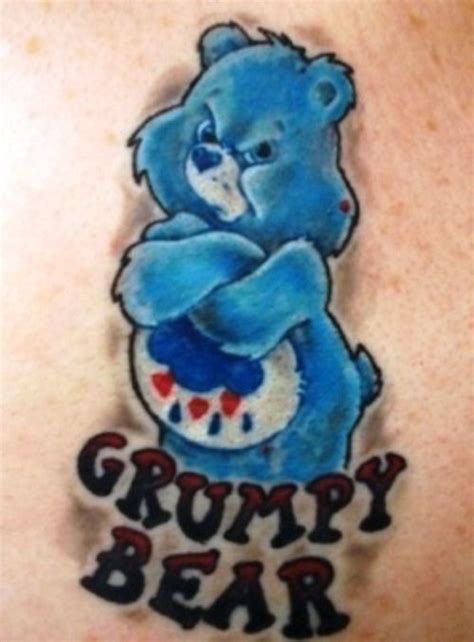 A Blue Bear With The Words Grumpy Bear Painted On Its Chest