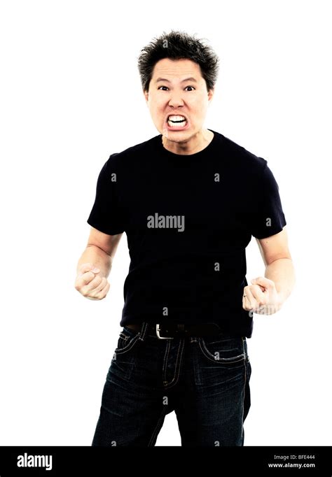 44 Year Old Asian Male Wearing Jeans And A Blue T Shirt Standing