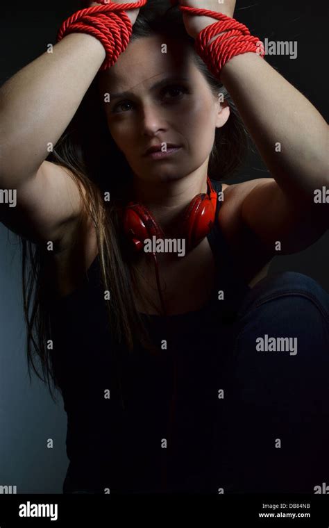 Beautiful Young Woman Tied With The Red Rope Stock Photo Alamy