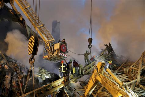 50 Firefighters Killed In Iran As Burning High Rise Collapses Los