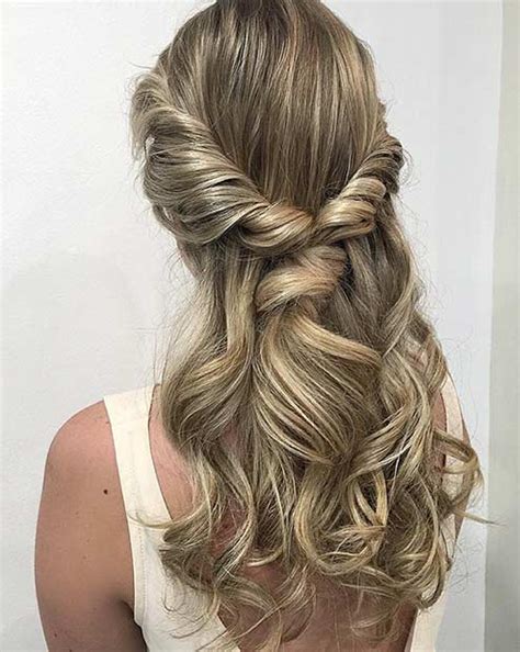Twist your hair from both sides along the temples and pin up at the back. Curly Hairstyles For Prom Half Up Down Twist - Hairstyles ...