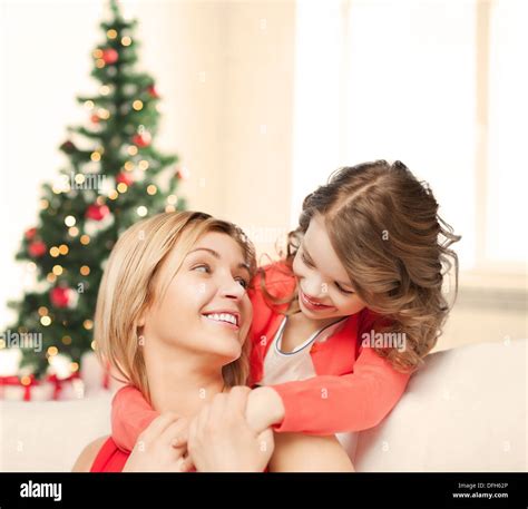 Hugging Mother And Daughter Stock Photo Alamy