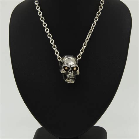 Handmade Silver Skull Necklace With Rose Gold Eyes Douglas Hughes Design