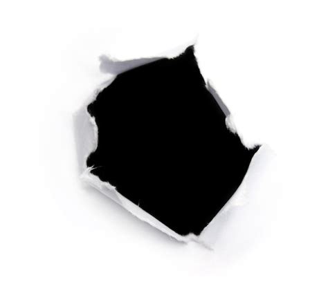 Premium Photo Black Hole On A White Paper