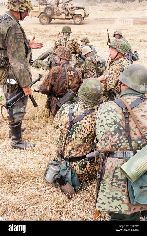 Second World War Re Enactment Group Of German Waffen Ss Soldiers In
