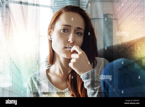Exhausted Woman Touching Her Lips While Crying Stock Photo Alamy