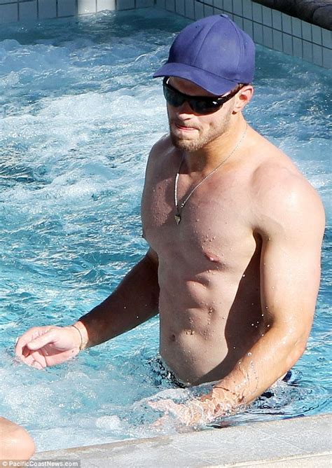 Kellan Lutz Shows Off His Impeccable Physique As He Relaxes Poolside