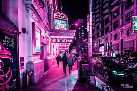 Nighttime Photos Capture Vibrant Pink Glow Of Times Squares Neon Lights