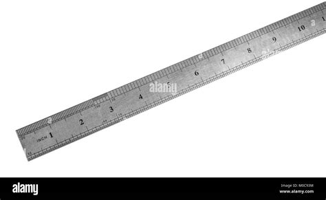 Metal Ruler In Centimeters Or Inches Measuring Tool On The White