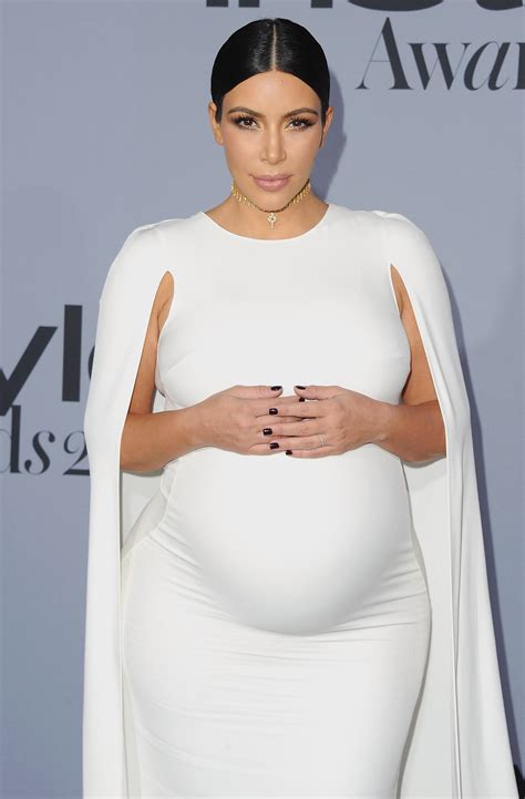 why is kim kardashian using a surrogate we ve got the answer