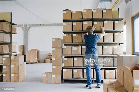 Man Reaching Shelf Photos And Premium High Res Pictures Getty Images