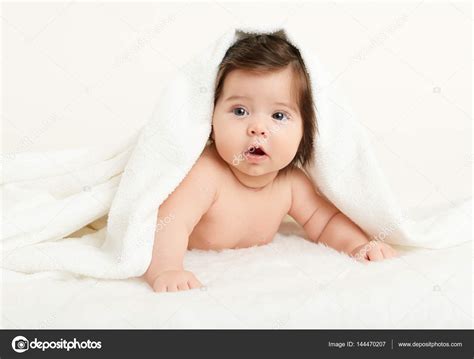 Adorably Baby Lie On White Towel In Bed Happy Childhood And Healthcare