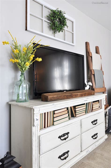 How To Decorate Over A Tv Stand Leadersrooms