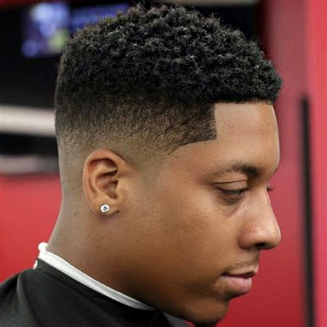 The subtle shaving that depicts a taper fade on the lower sides draws much attention to the onlookers. 51 Best Hairstyles For Black Men (2021 Guide)