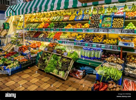 Fruit And Vegetables For Sale On A Stall In Oxford Covered Market Stock
