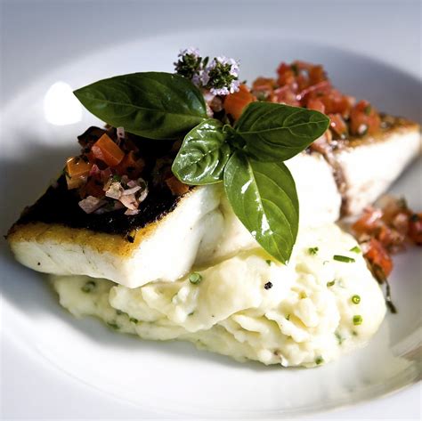 Roasted Wild Sea Bass Mashed Potatoes Tomatoes And Fresh Thyme Seafood Recipes Dinner