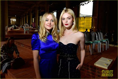 Sisters Dakota And Elle Fanning Sit Front Row At Miu Miu Show Photo