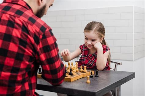 Premium Photo Father And Daughter Playing Chess On Fathers Day
