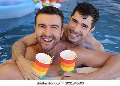 Gorgeous Interracial Gay Couple Swimming Pool Stock Photo