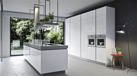 Solid high gloss acrylic panels can take a lot of abuse. Zina Acrylic Handleless High Gloss Kitchens | Kitchens London