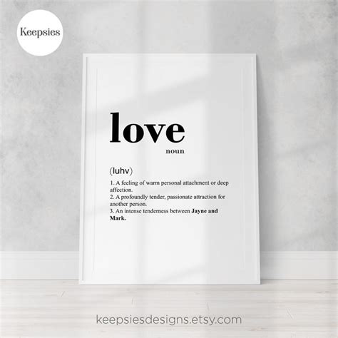 A White Poster With The Words Love On It In Black And White Against A
