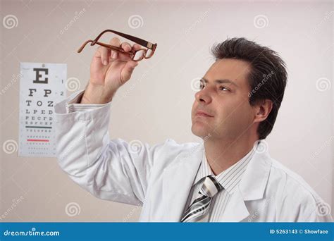 Optometrist Inspects Eye Glasses Stock Image Image Of People Looking 5263143