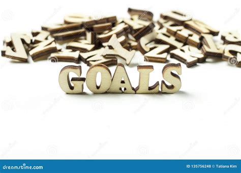 The Word Goal Written In Wooden Letters The Concept Of Setting Goals