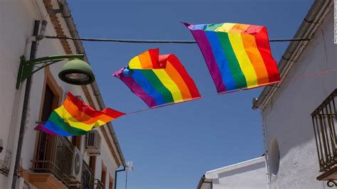 spanish town decks itself in pride flags after town hall forced to take its flag down cnn