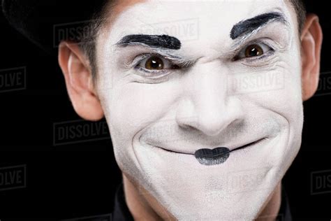Evil Mime Looking At Camera Isolated On Black Stock Photo Dissolve