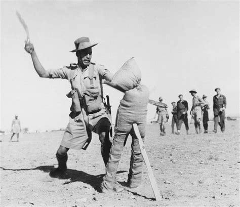 A Gurkha Soldier Demonstrates How To Use The Kukri Fighting Knife 1944