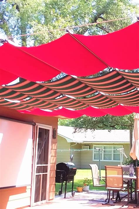 Red And Green Striped Fabric Retractable Canopies On Slide Wire