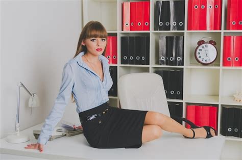 Premium Photo Beautiful Seductive Secretary Sits On Your Desk