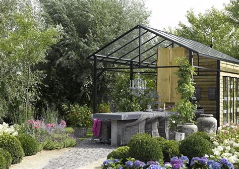 Naturgarten im landhausstil dekoration & inspiration tipps & tricks. Modernes Gartenhaus ein Exclusiver Garten