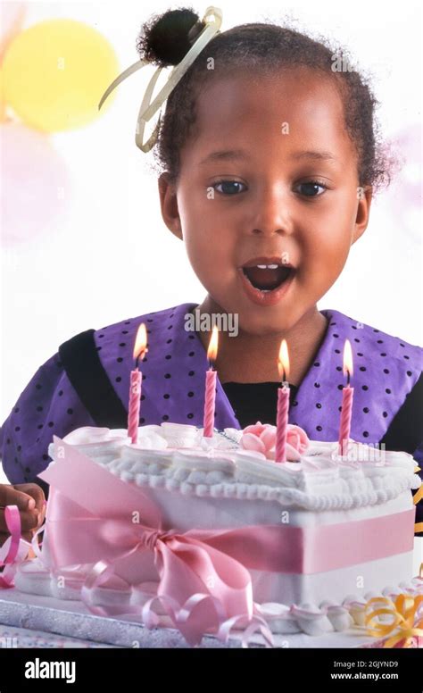African Caribbean Girl Years Old Birthday Blowing Out The Candles On Her Traditional Birthday