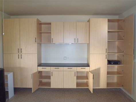 Regardless of the size or configuration of your garage (sloping ceiling or floors, pillars, windows), our designers can help you design garage storage systems and organization solutions that work. Premium cabinet in dark ash. | Custom cabinets, Garage ...
