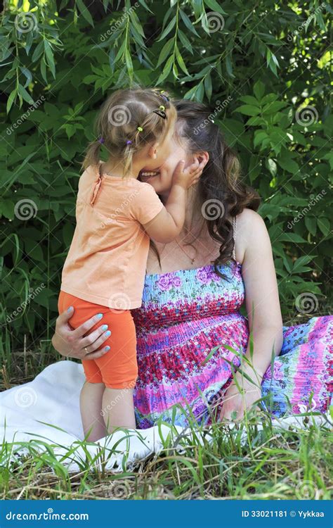 Girl Tenderly Kisses And Hugs His Mother Stock Image Image Of Embryo Relationships 33021181