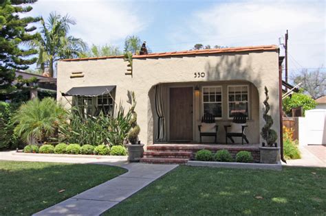 Painting a home's exterior can hugely amplify curb appeal, but it's difficult to pick exterior paint colours, as they often look much lighter outdoors than they would inside. Spanish Bungalow - Mediterranean - Exterior - orange ...