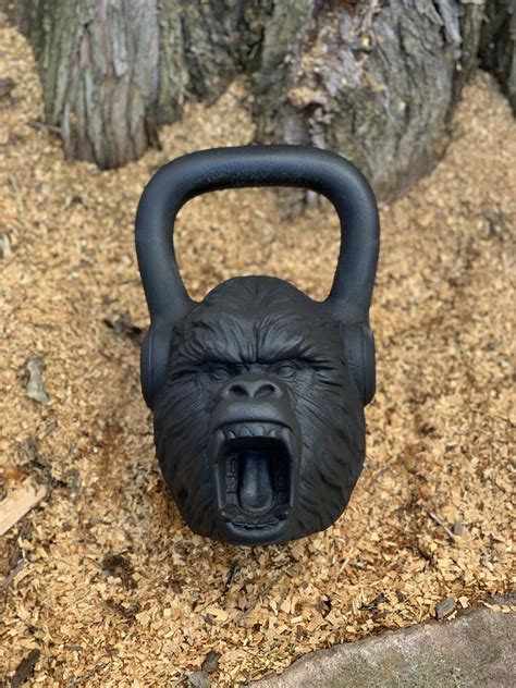 The gorilla clean involves alternating two 32kg primal bells into the rack position. Gorilla Kettlebell | Tactical Fitness
