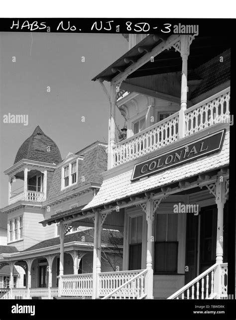 Main Facade Detail Of Porch With Streetscape In Background Colonial Hotel Beach And Ocean