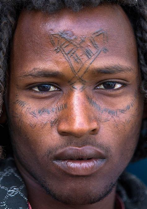 Afar Tribe Man With Curly Hair And Facial Tattoos Assayta Ethiopia
