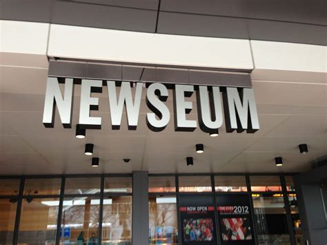 The Entrance To A Newseum With Large Letters Above It
