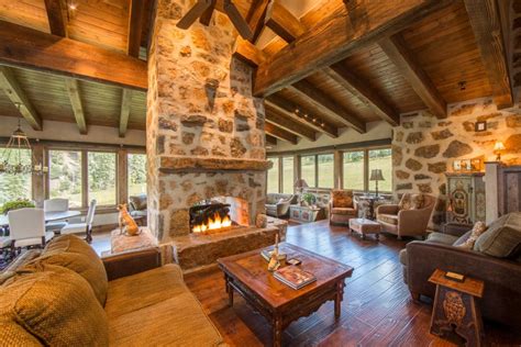 Rustic Great Room With Stone Chimney Hgtv