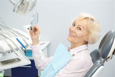 Dental Implants Vs Dentures Genesis Dental Utah And Kansas Dentist