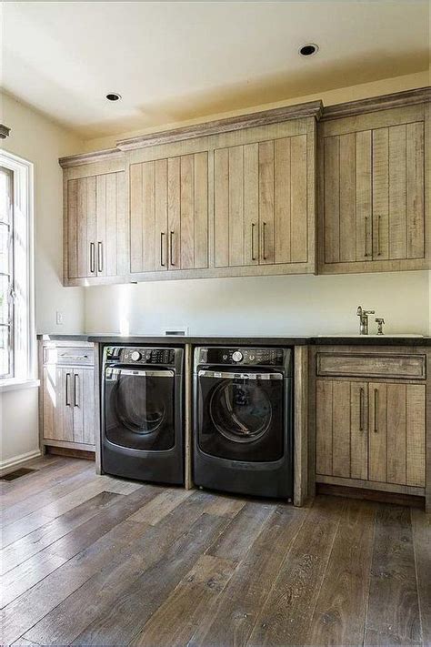 Very few people enjoy spending some time doing laundry and the laundry room tends to get overlooked when it comes to decorating. Rustic Laundry Rooms - Country - Laundry Room - John Hummel