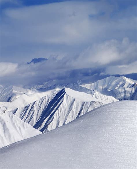 Top Of Off Piste Snowy Slope And Cloud Mountains Stock Photo Image Of