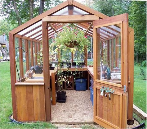 30 diy greenhouses that will look amazing in your backyard. Small wooden greenhouse | Backyard greenhouse, Wooden ...