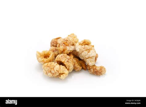 A Closeup Of Deep Fried Pig Skin On A White Background Stock Photo Alamy