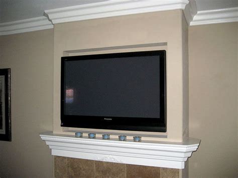 recess mount tv  fireplace allowing long   sofa