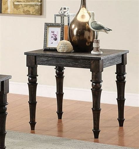 4 x 4 coffee table leg mounted between lathe centers with scribe mark to indicate turned cylindrical section. Acme 81616 Kami antique black finish wood end table with ...