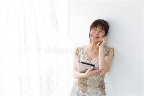 a stylish japanese middle aged woman stock image image of beautiful asia 165273367